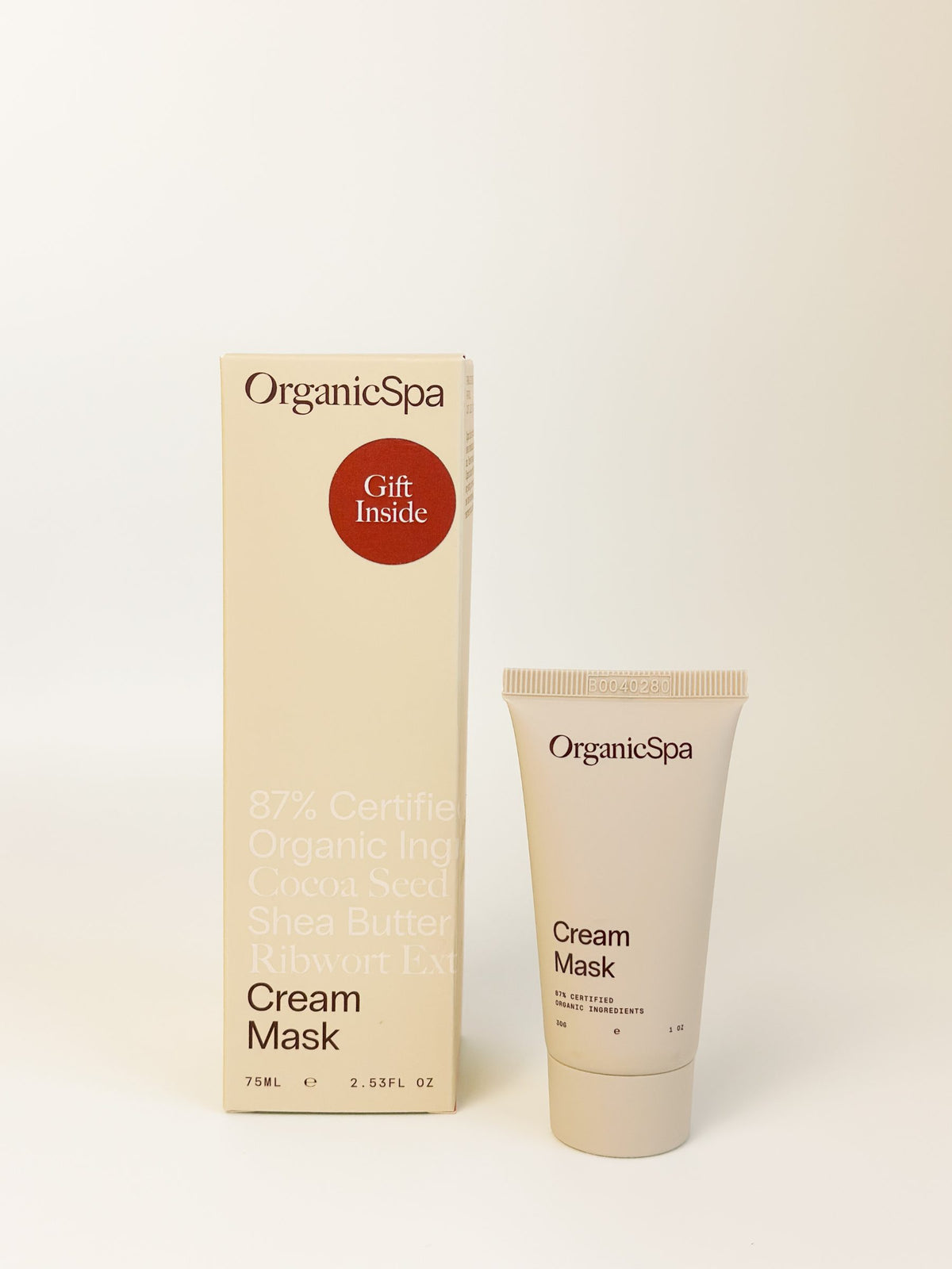OrganicSpa Cream Mask carton with a Gift Inside sticker, beside the 30g Cream Mask Mini included with every full size.