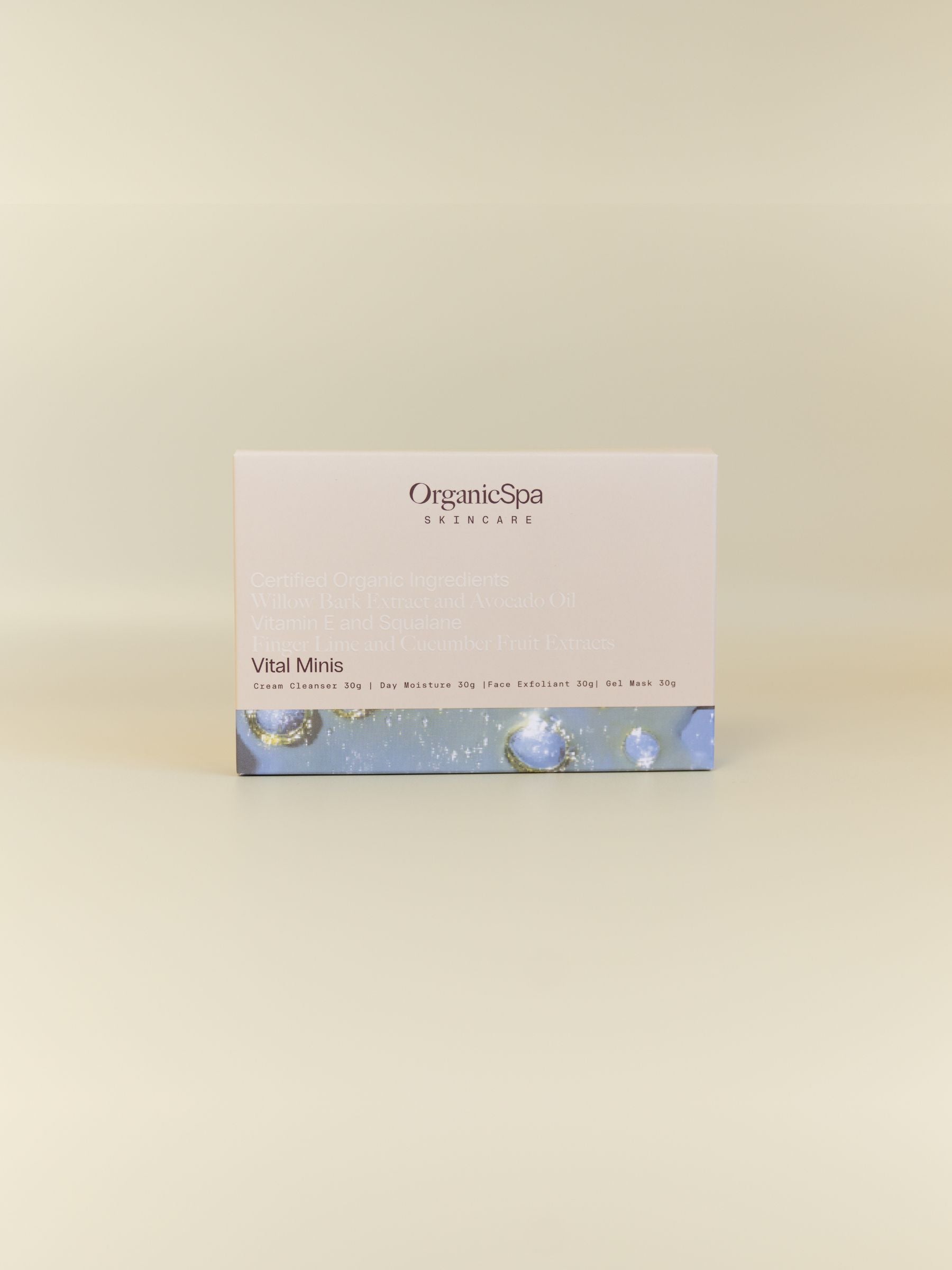 OrganicSpa Vital Minis packaging, a Certified Organic 4 x 30g travel skincare set with Cream Cleanser, Day Moisture, Face Exfoliant and Gel Mask.