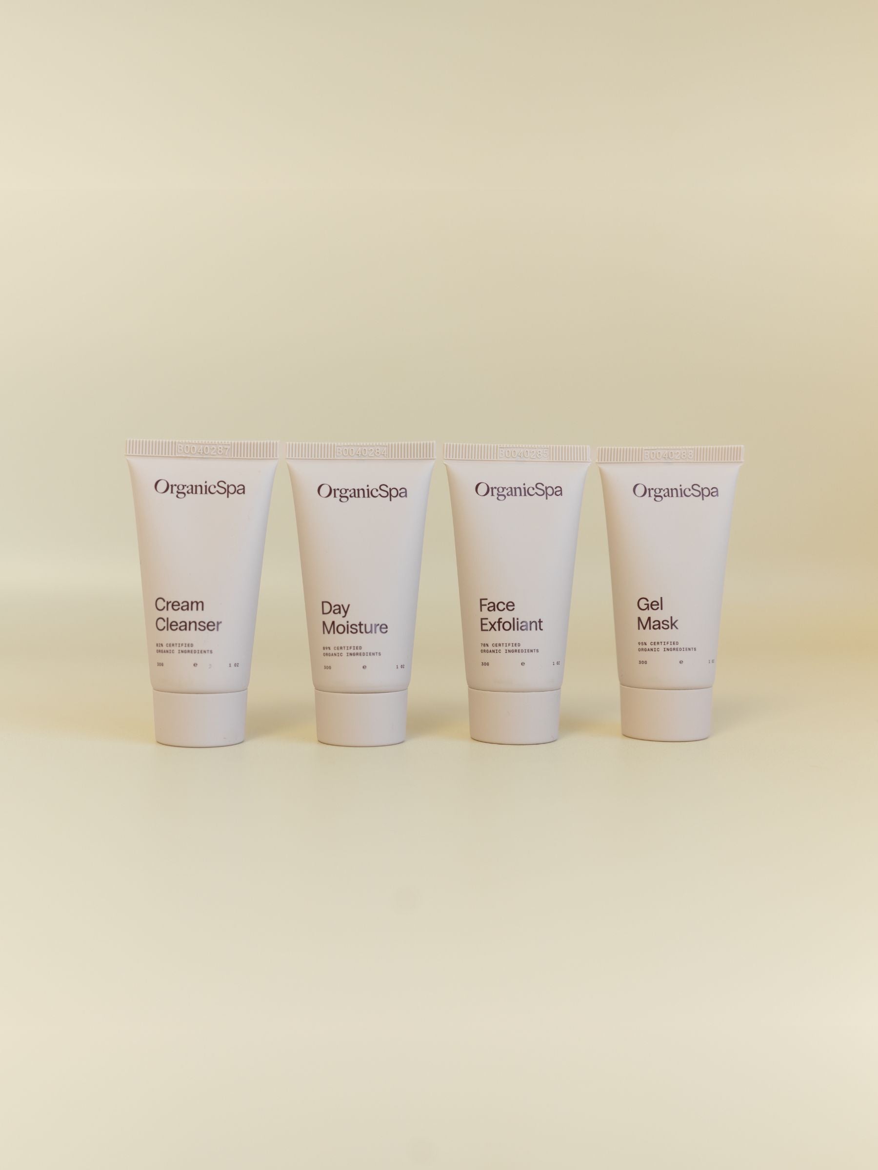 OrganicSpa Vital Minis skincare set — Cream Cleanser, Day Moisture, Face Exfoliant and Gel Mask, 30g each, Certified Organic skincare for normal and combination complexions.