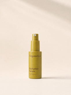 OrganicSpa Biohydra+ Serum, a chartreuse 30ml pump bottle marked 93% Certified Organic Ingredients, on a plain cream background.