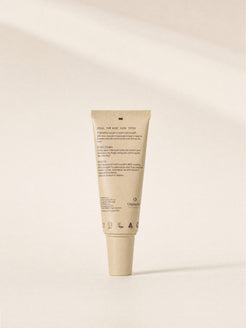 The back of the OrganicSpa Eye Balm tube. Ideal for most skin types. A refreshing eye gel to soothe and de-puff, with Aloe Vera and Chamomile Extract to help hydrate and calm and revive the look of tired, dry eyes. Apply a thin layer to the eye contour with your ring finger, taking care not to tug the skin, daily. Certified COSMOS Organic by ACO, with vegan, cruelty free, Australian made and recyclable symbols.
