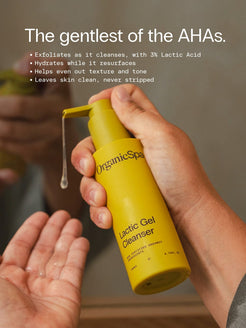 A hand dispensing OrganicSpa Lactic Gel Cleanser, a Certified Organic exfoliating cleanser with 3% Lactic Acid for smoother, brighter skin.