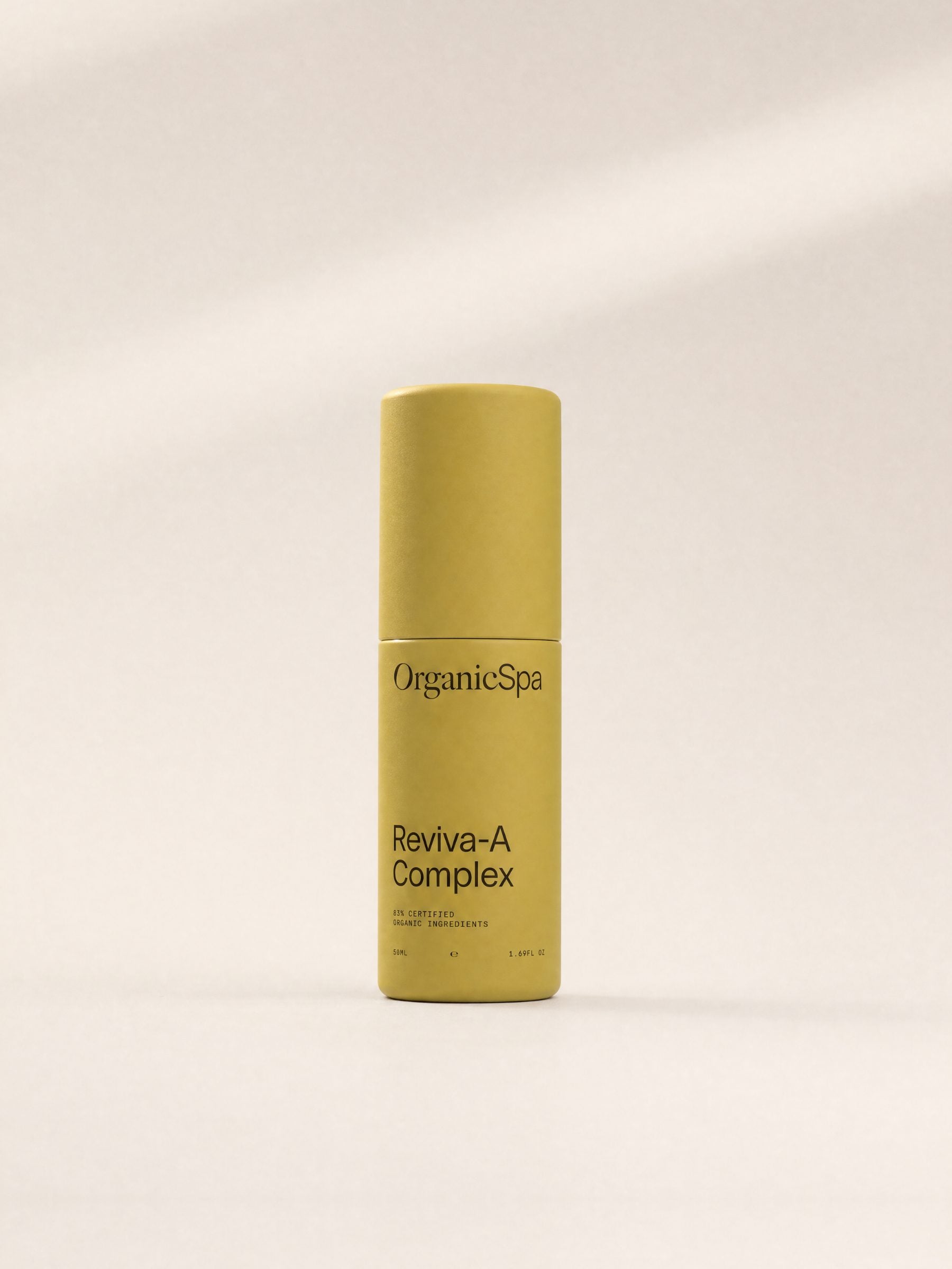 OrganicSpa Reviva-A Complex, a chartreuse 50ml bottle marked 83% Certified Organic Ingredients, on a plain background.